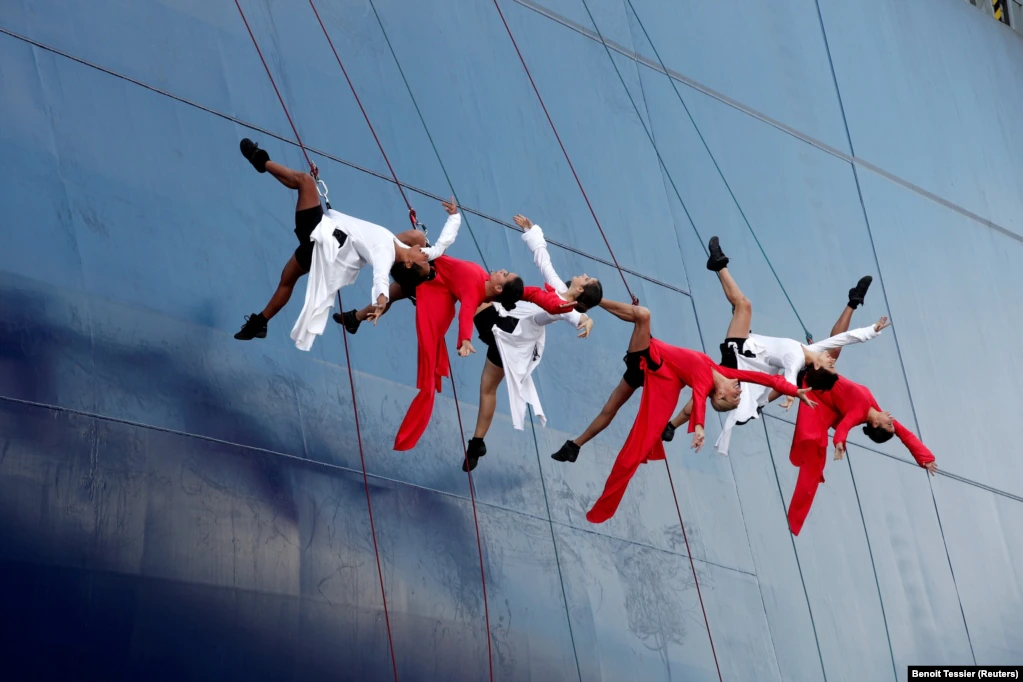 A group of dancers performs during the launch of a container ship in Le Havre, France.&nbsp; (Reuters/Benoit Tessier)