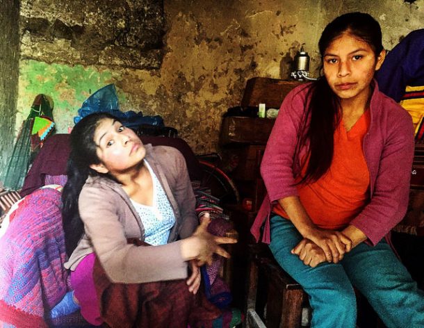 Carmen Rosa (left) and Maria Elena in their small home in Cajamarca, Peru. Credit: Andrea Vale/IPS