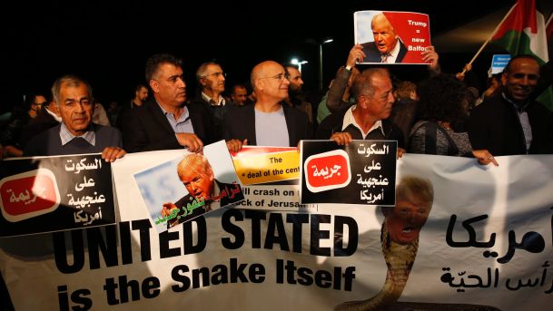 Israeli Arabs protest Trump's Jerusalem move outside the U.S. Embassy in Tel Aviv, December 12, 2017.